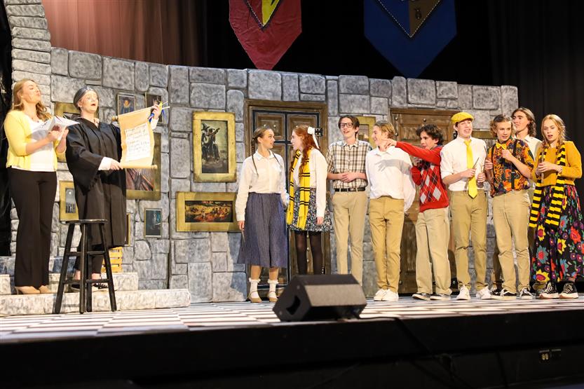 Students perform onstage